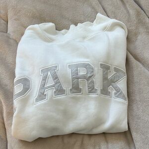 SOLD on another app! Don’t buy!! Parke mockneck white with grey letters